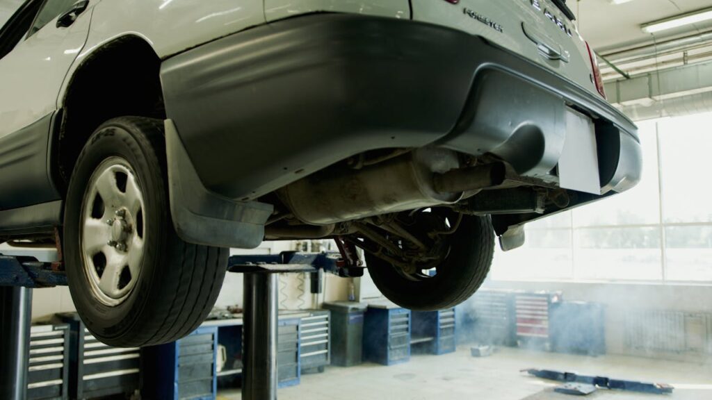 car lifted showing exhaust